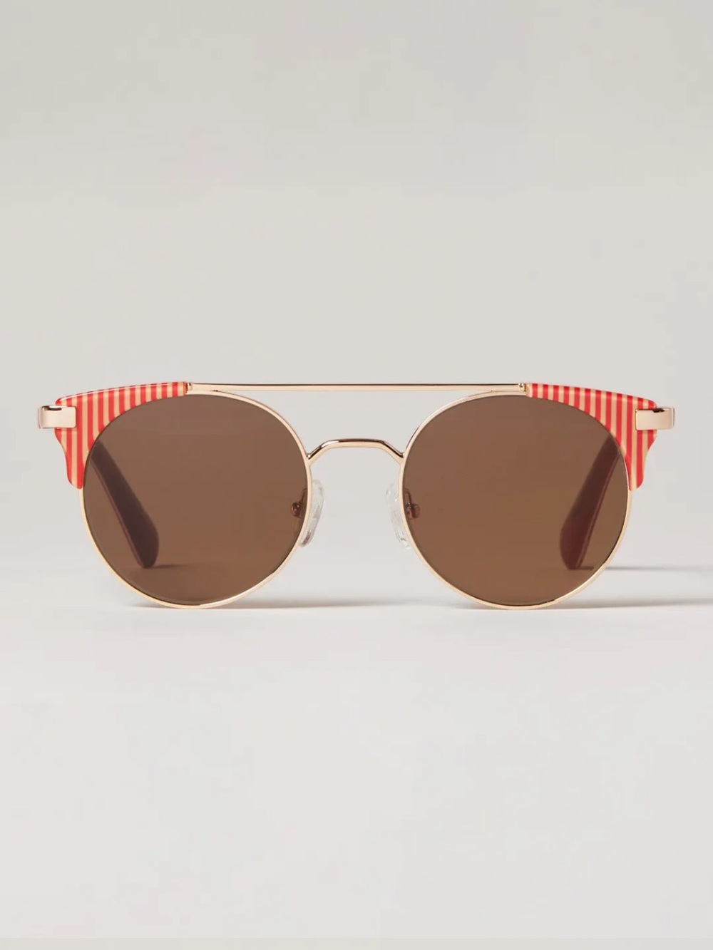 Lele Sadoughi Gold Round Sunglasses with Red & White Stripe Details